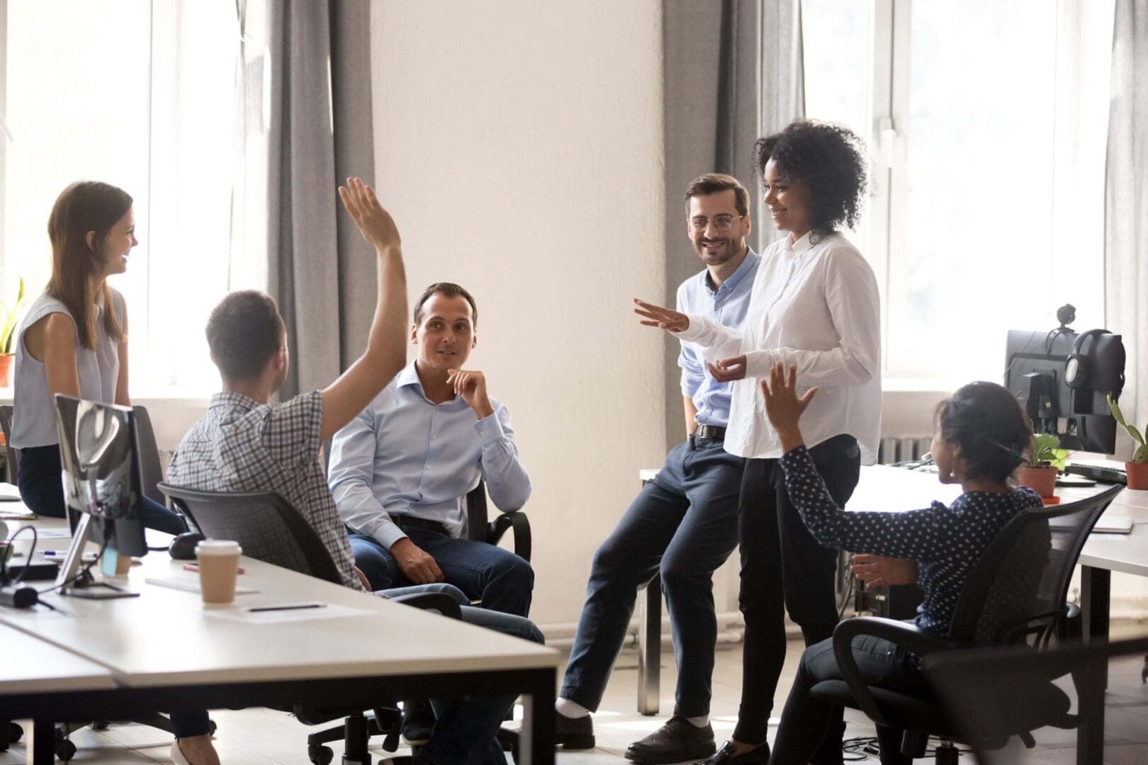Team engaged in discussion in an office.