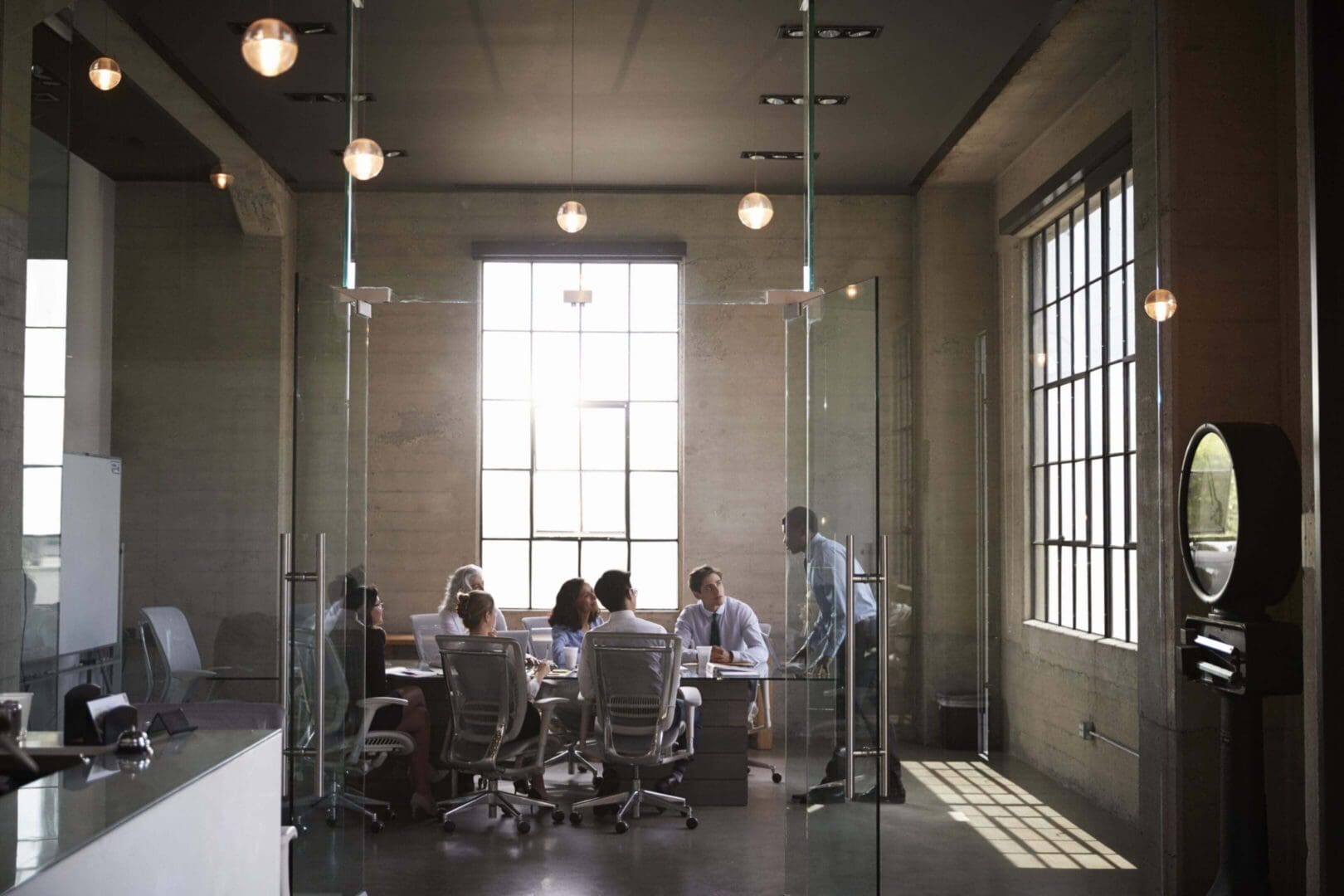 People having a meeting in modern office.