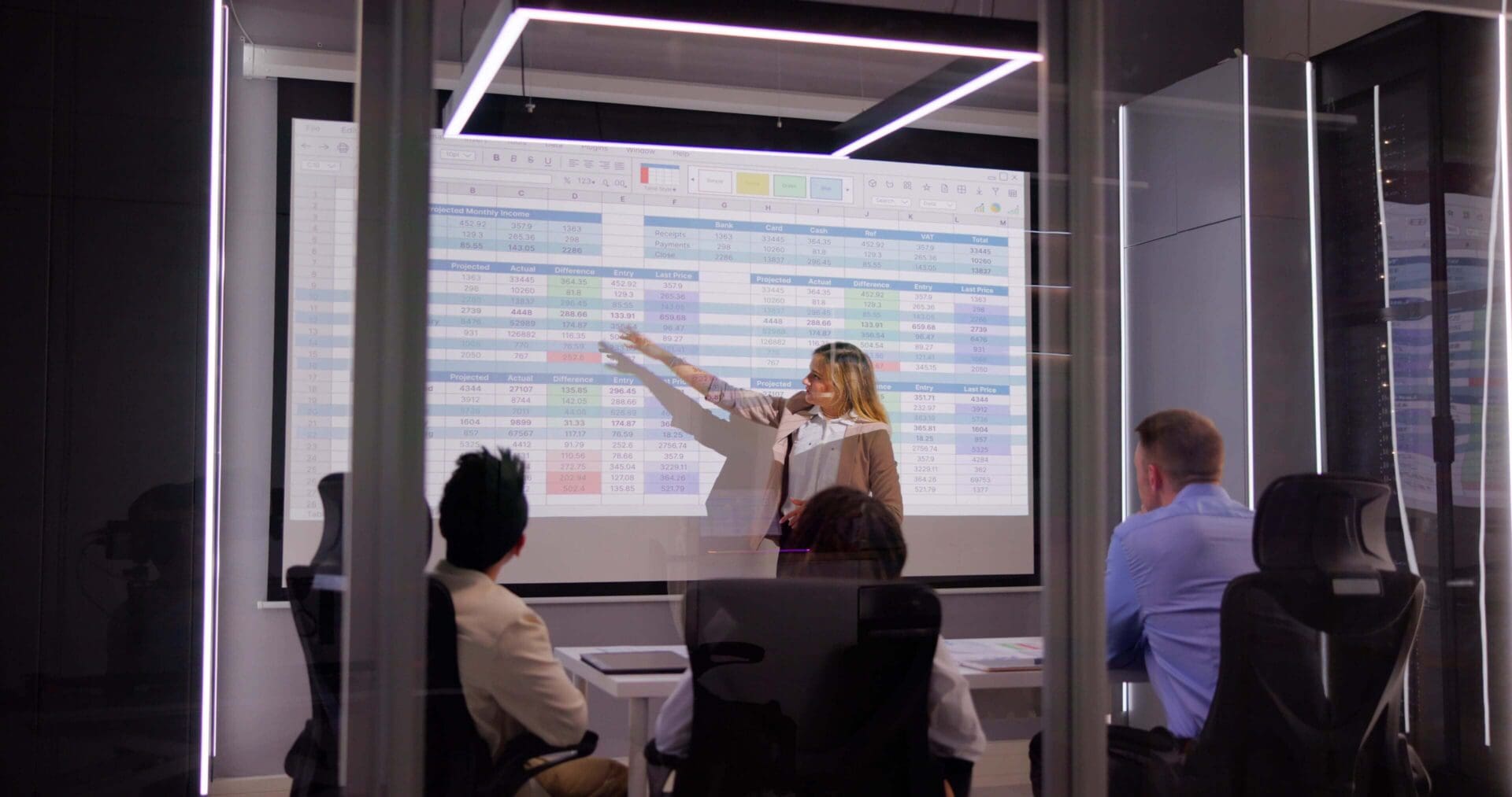 Person presenting data to a group.