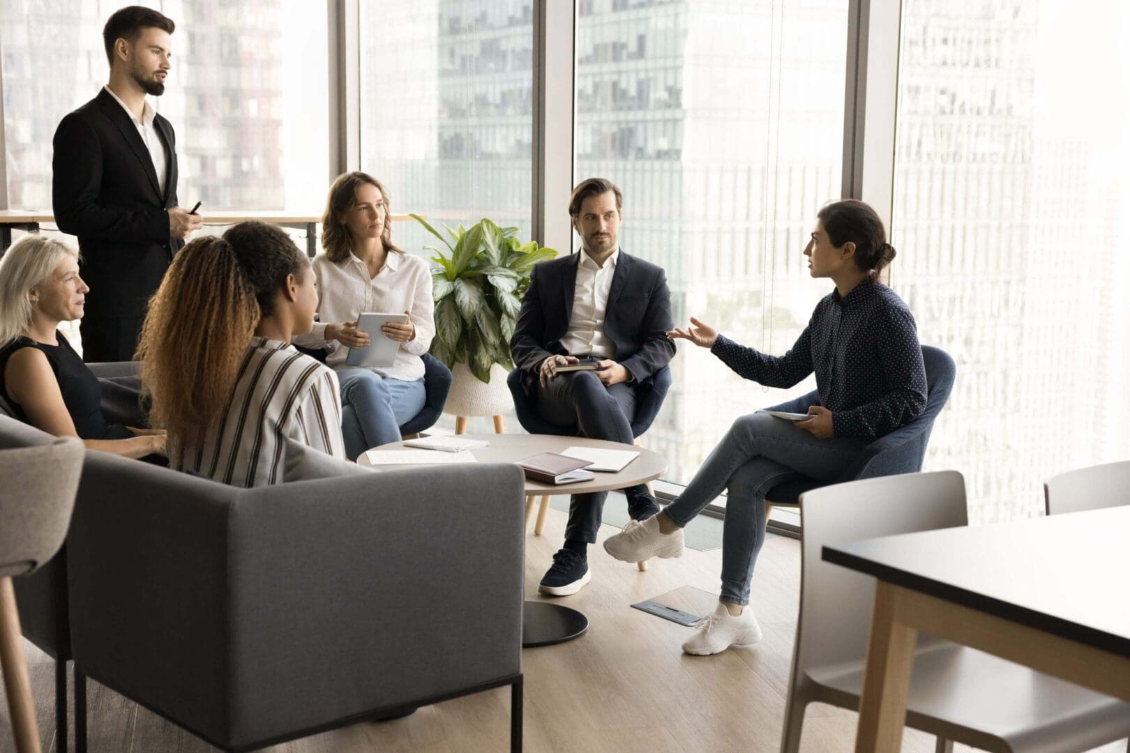 Group discussing in a modern office space.