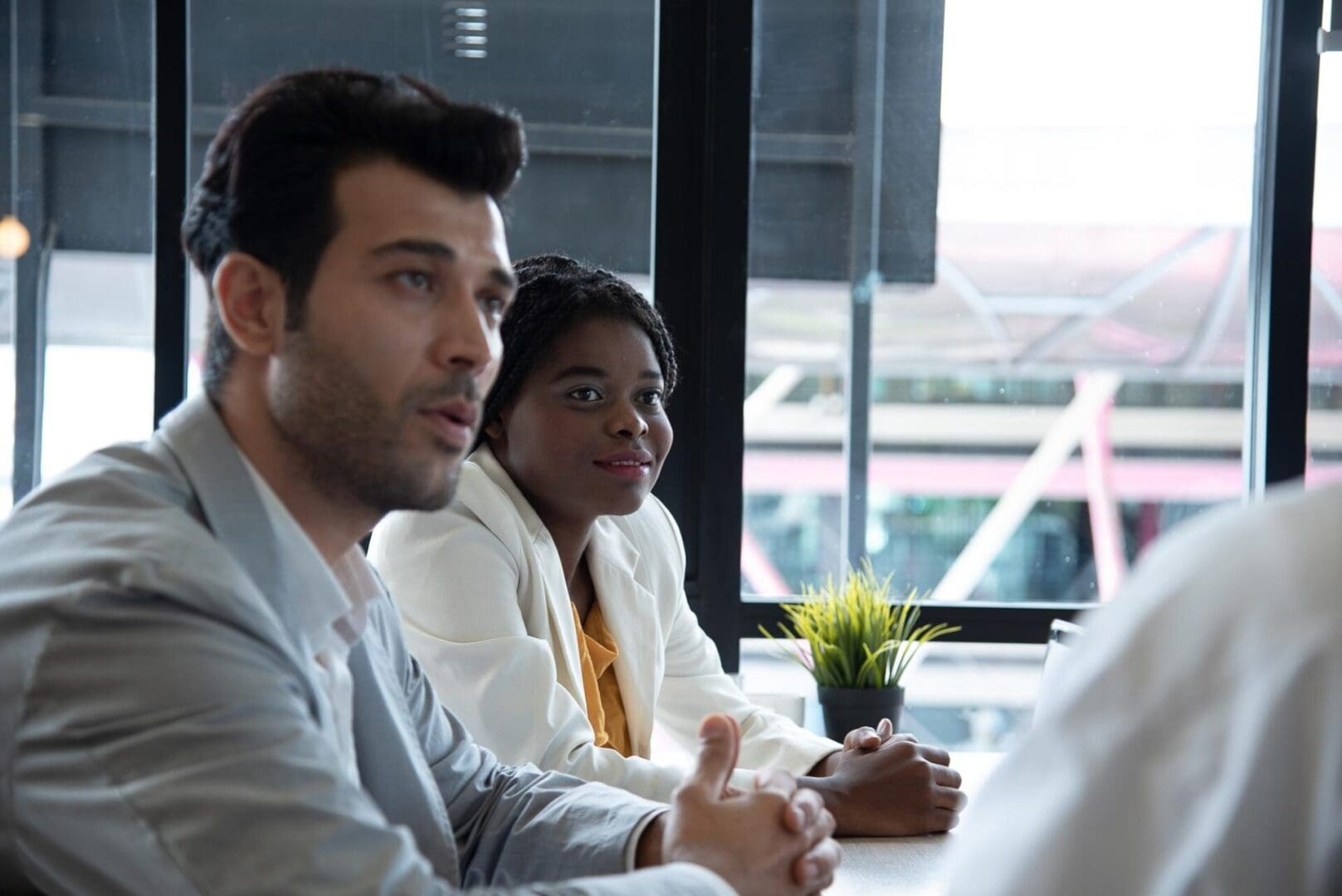 Two people in a business meeting.