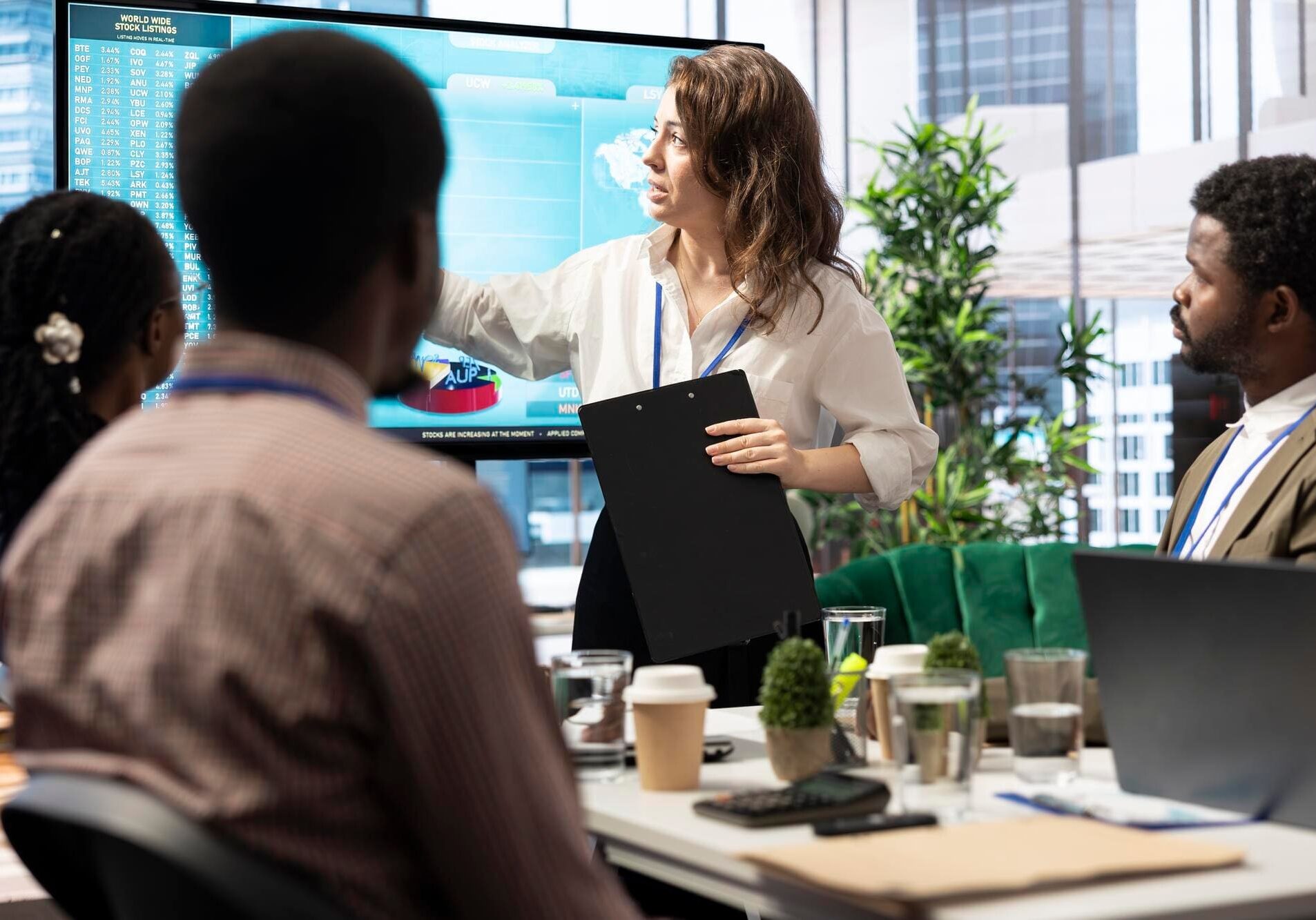 Business meeting with presentation in modern office.