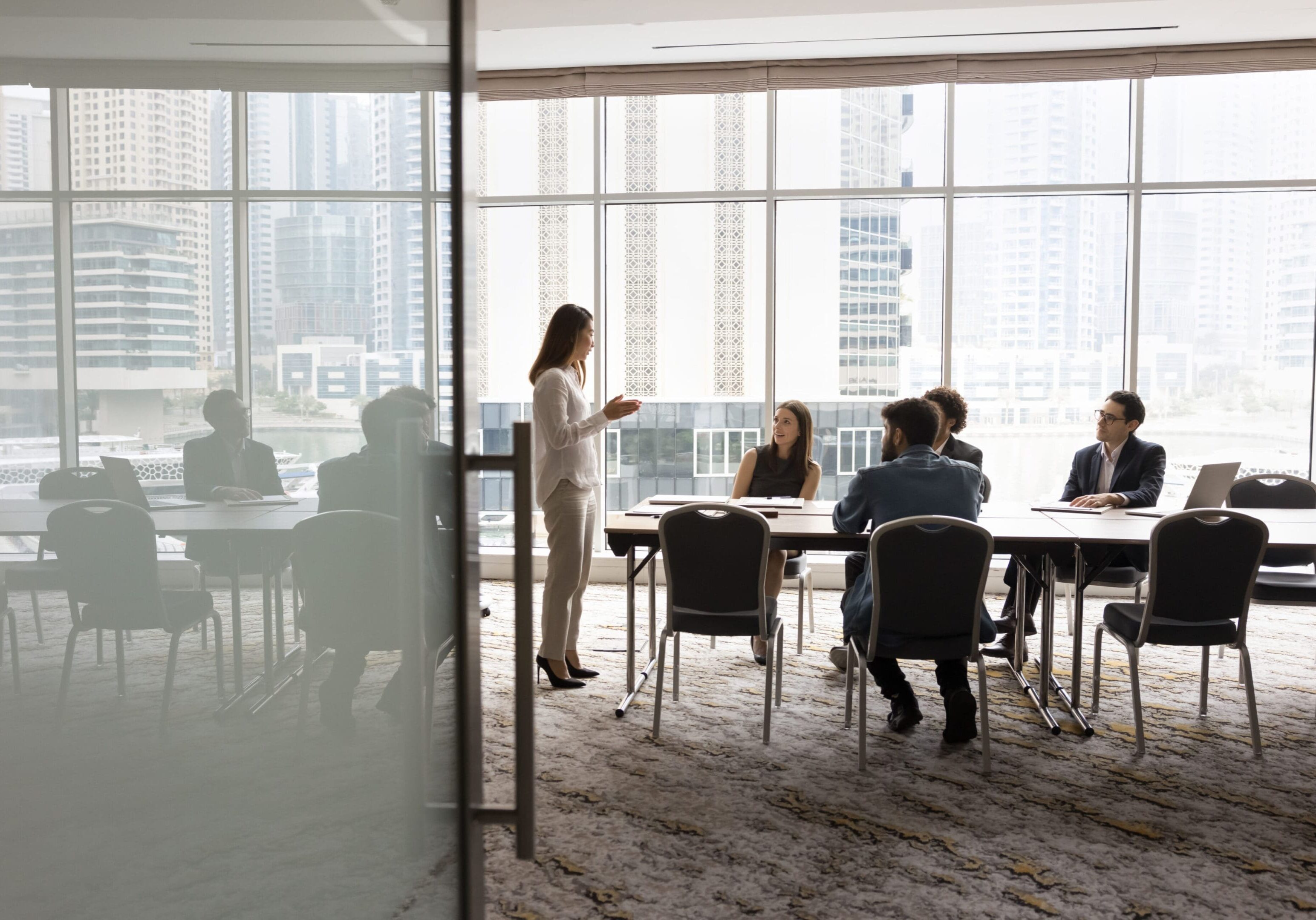 Business meeting in a modern conference room.