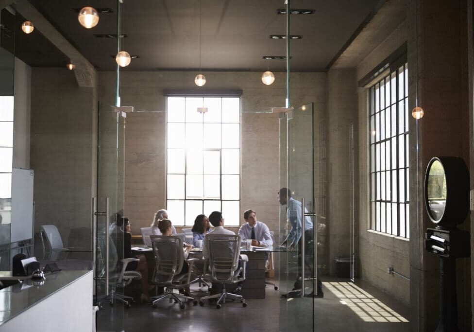 People having a meeting in modern office.