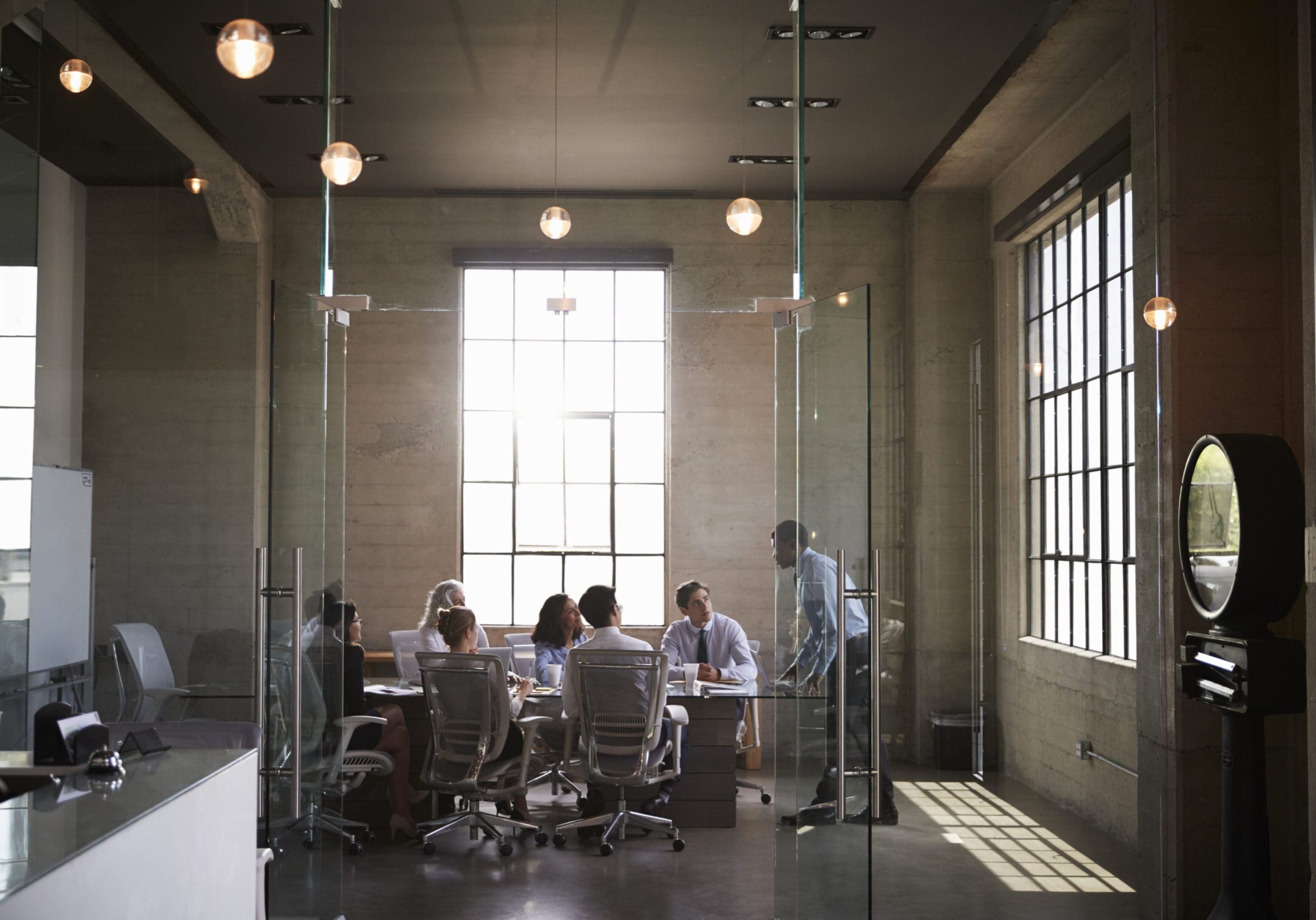 People having a meeting in modern office.