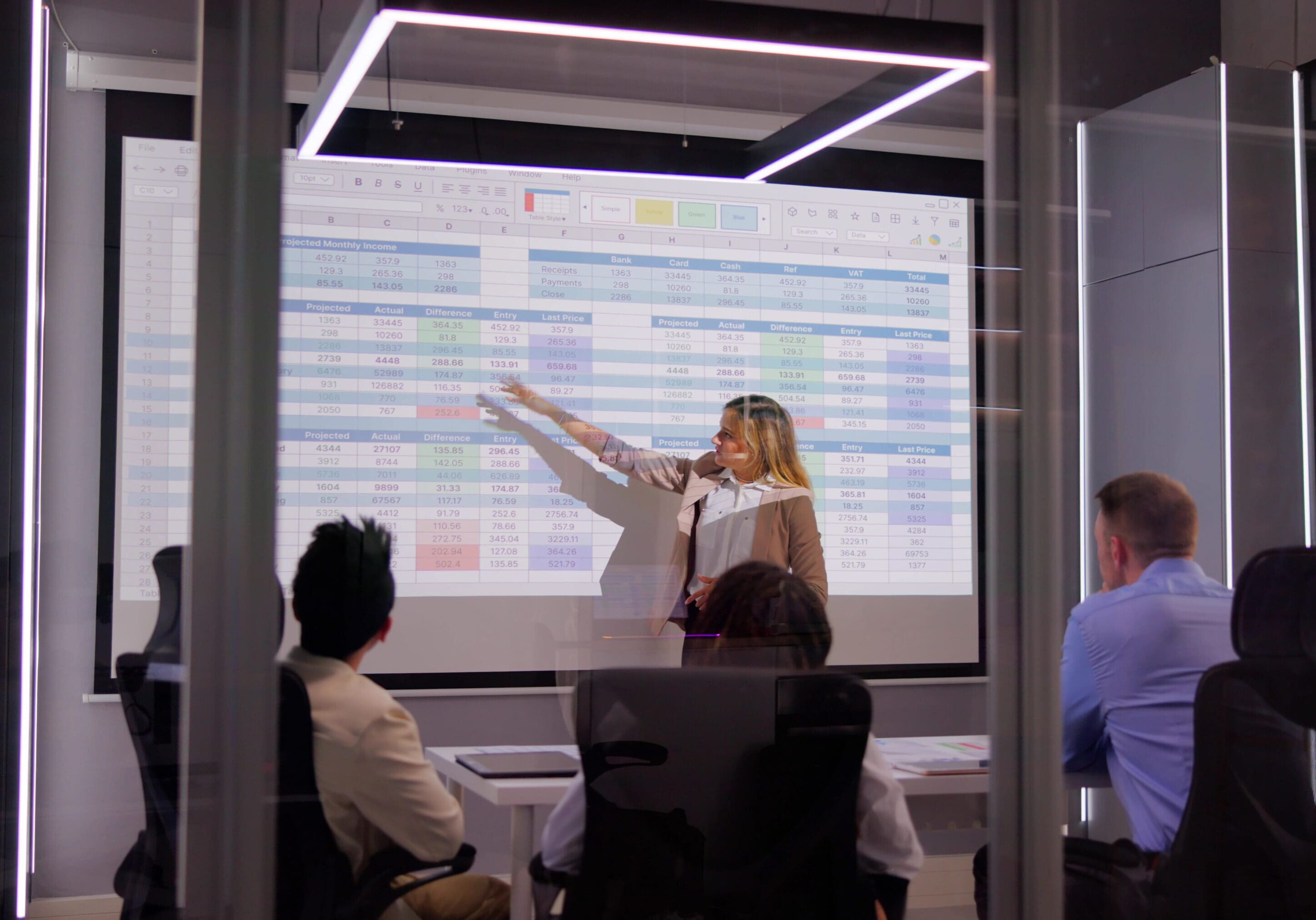 Person presenting data to a group.