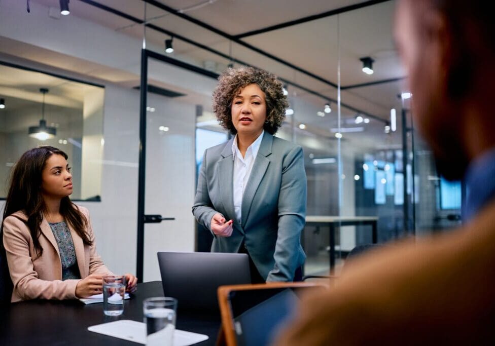 Business meeting in a modern conference room.