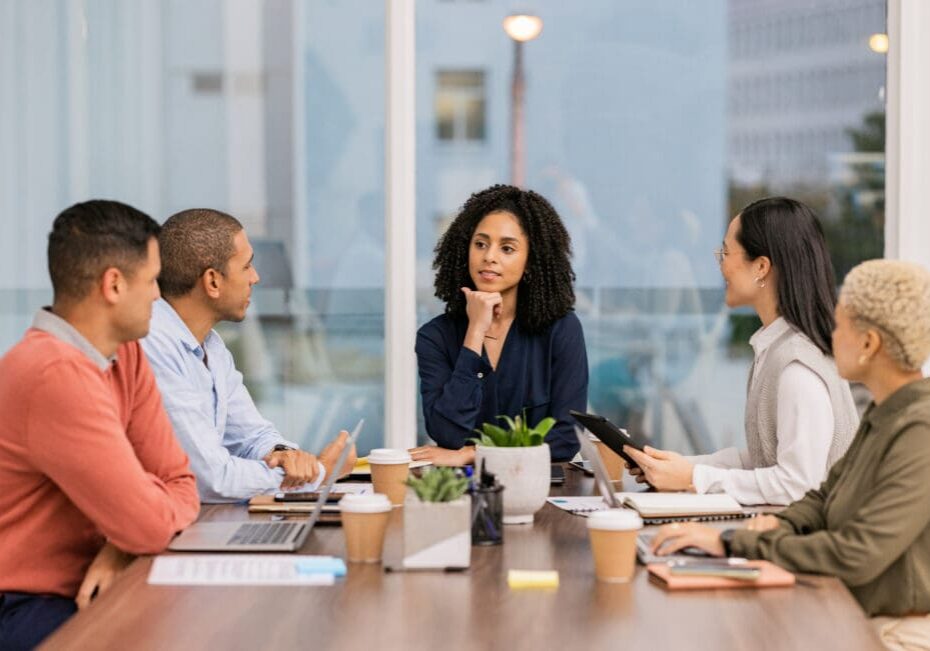 Team meeting around a conference table.