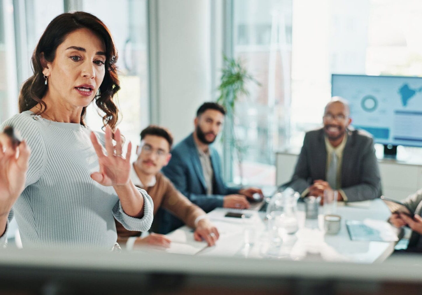 Business presentation in a modern office setting.
