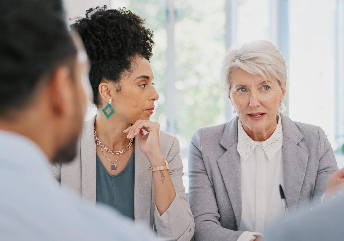 Two colleagues engaged in a business discussion