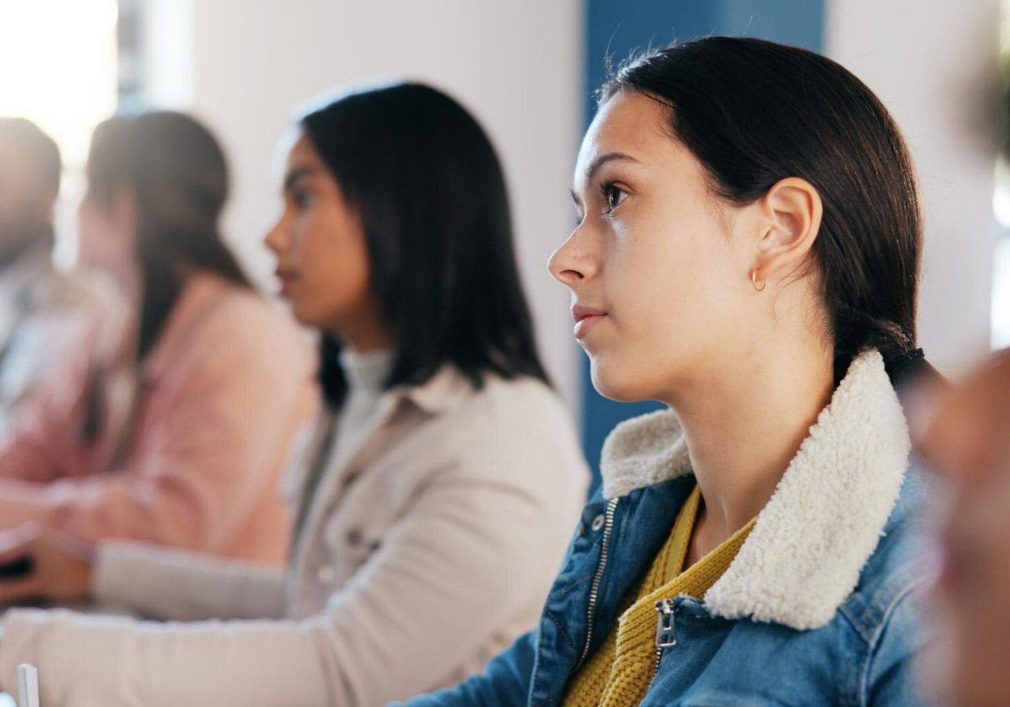 Student attentively listening in class