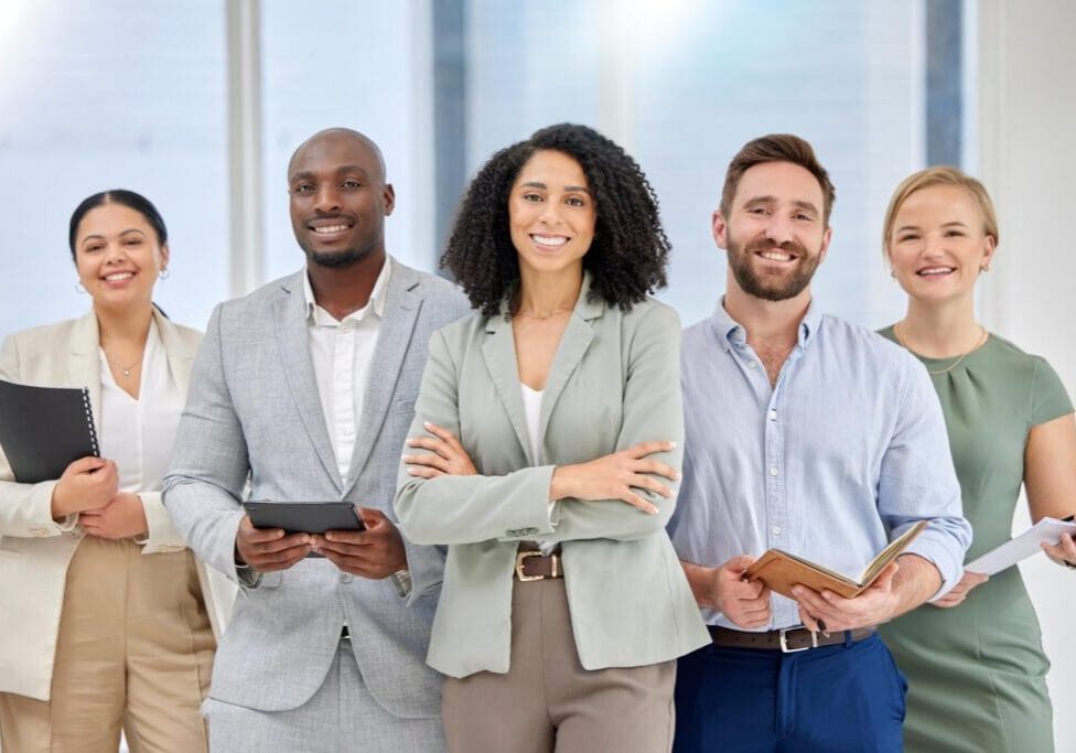 Smiling diverse business team in modern office
