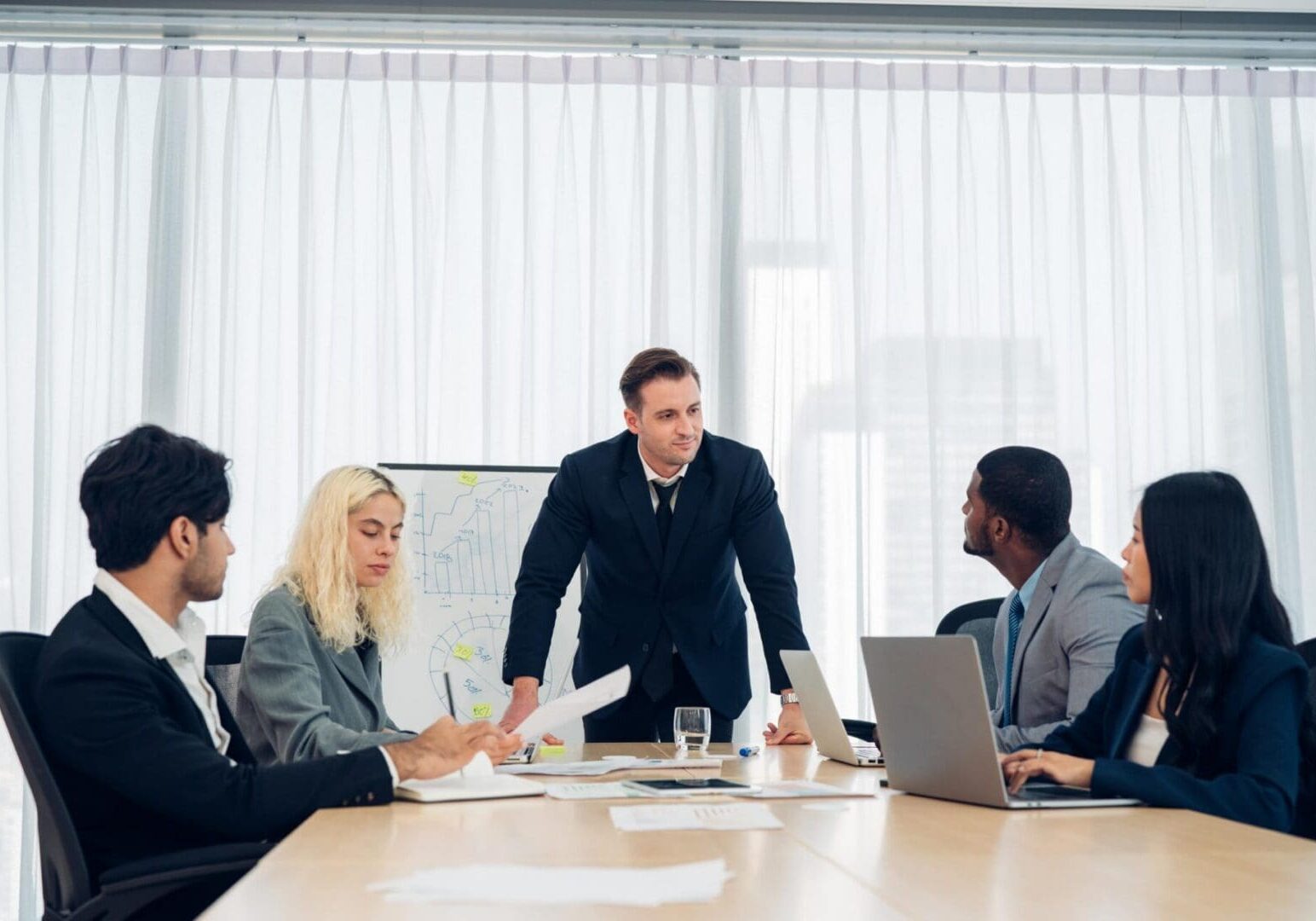 Multiracial business people having meeting and brainstorming discussed about work in conference room in the creative office.